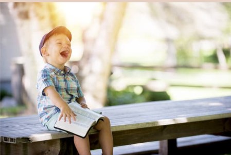 Humor-Kid Laughing Outside